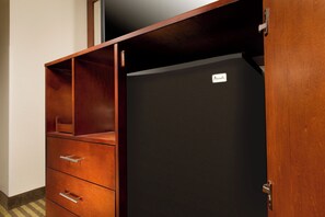 A wooden wardrobe with a black door and a nameplate. - Comfort Inn Downtown DC/Convention Center (Washington)