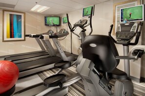 A fitness center with treadmills, elliptical machines, and exercise balls. - Comfort Inn Downtown DC/Convention Center (Washington)