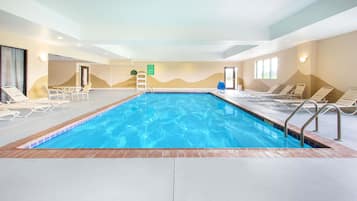 Indoor pool, open 7:00 AM to 10:00 PM, pool loungers