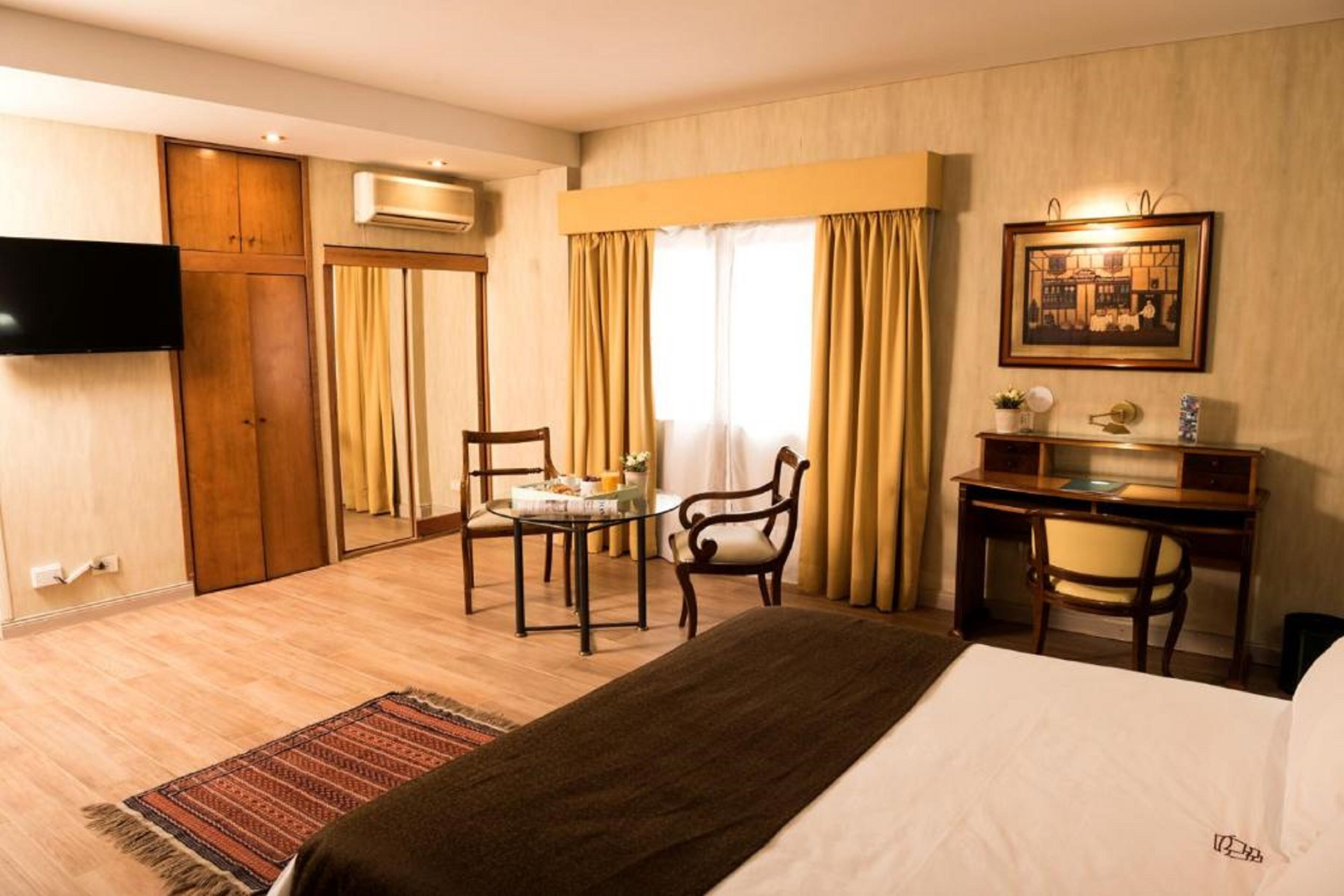 Foto - Mayflower Suites