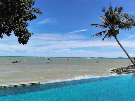 Outdoor pool, pool umbrellas, sun loungers