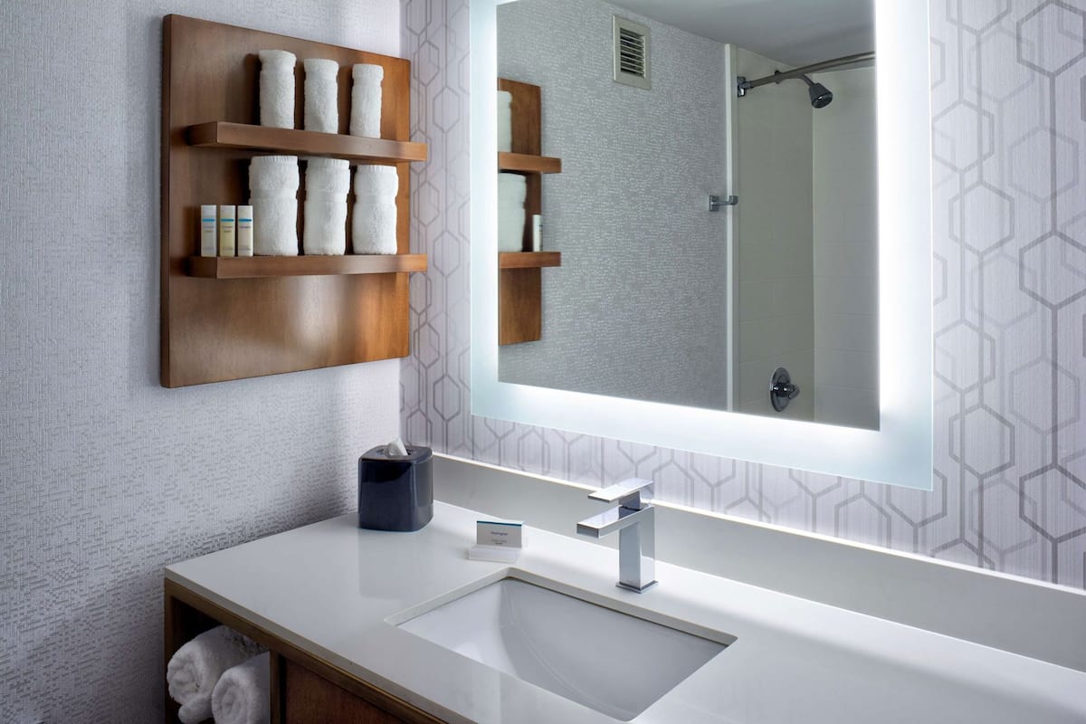 Bathroom | Combined shower/tub, designer toiletries, hair dryer, towels