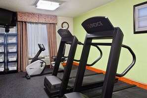 Stay active on your vacation with a fully equipped fitness room featuring a treadmill and elliptical machine.