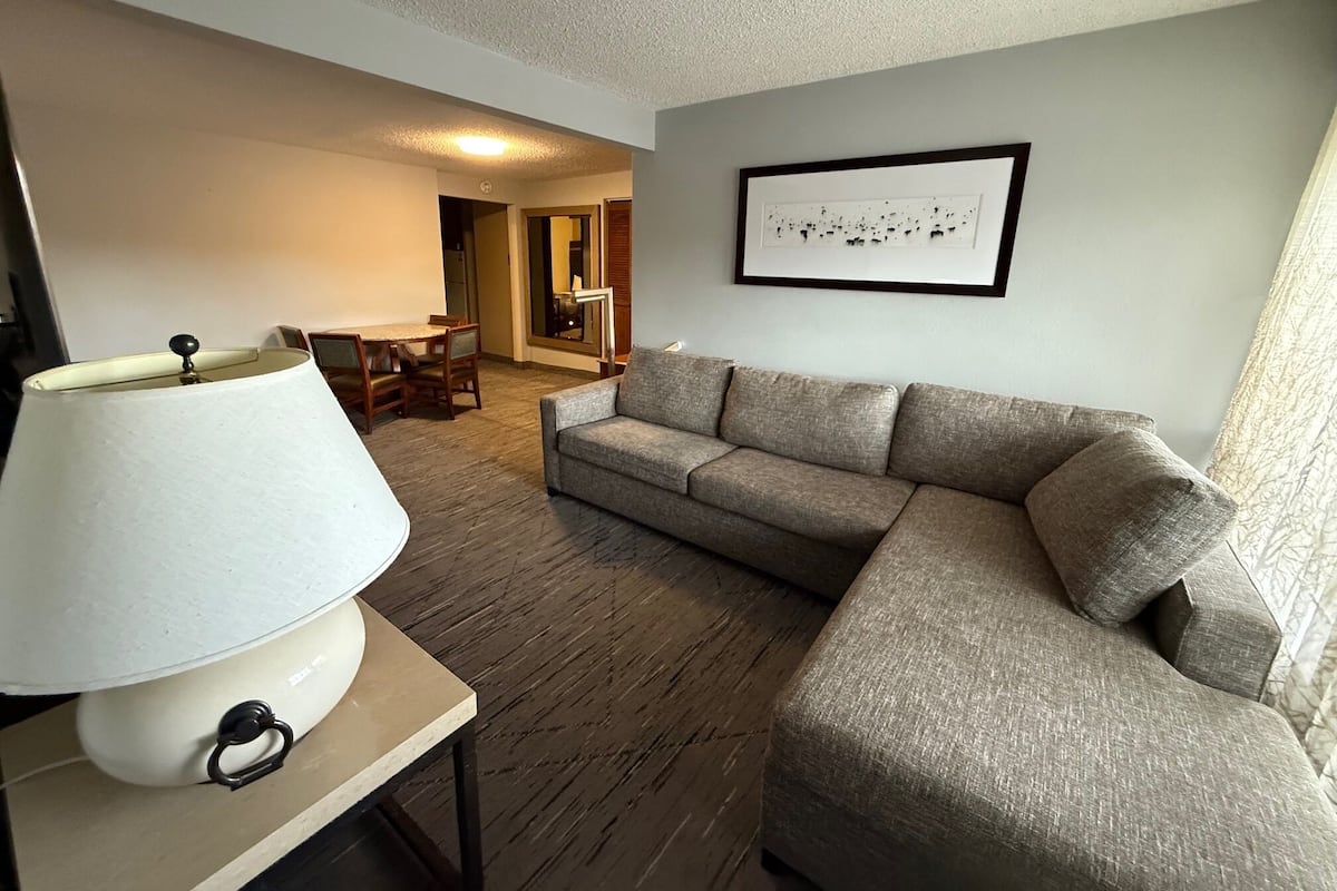 Family Apartment, 1 Bedroom | Living area | 55-inch flat-screen TV with cable channels, TV