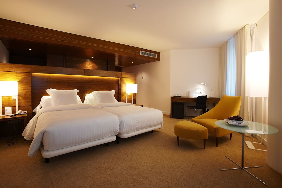 double or twin room (santa maria plus) | minibar, in-room safe, desk, laptop workspace