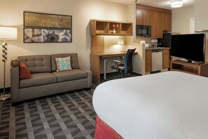 Studio, 1 Queen Bed with Sofa bed | Living area | 25-inch LCD TV with cable channels, TV