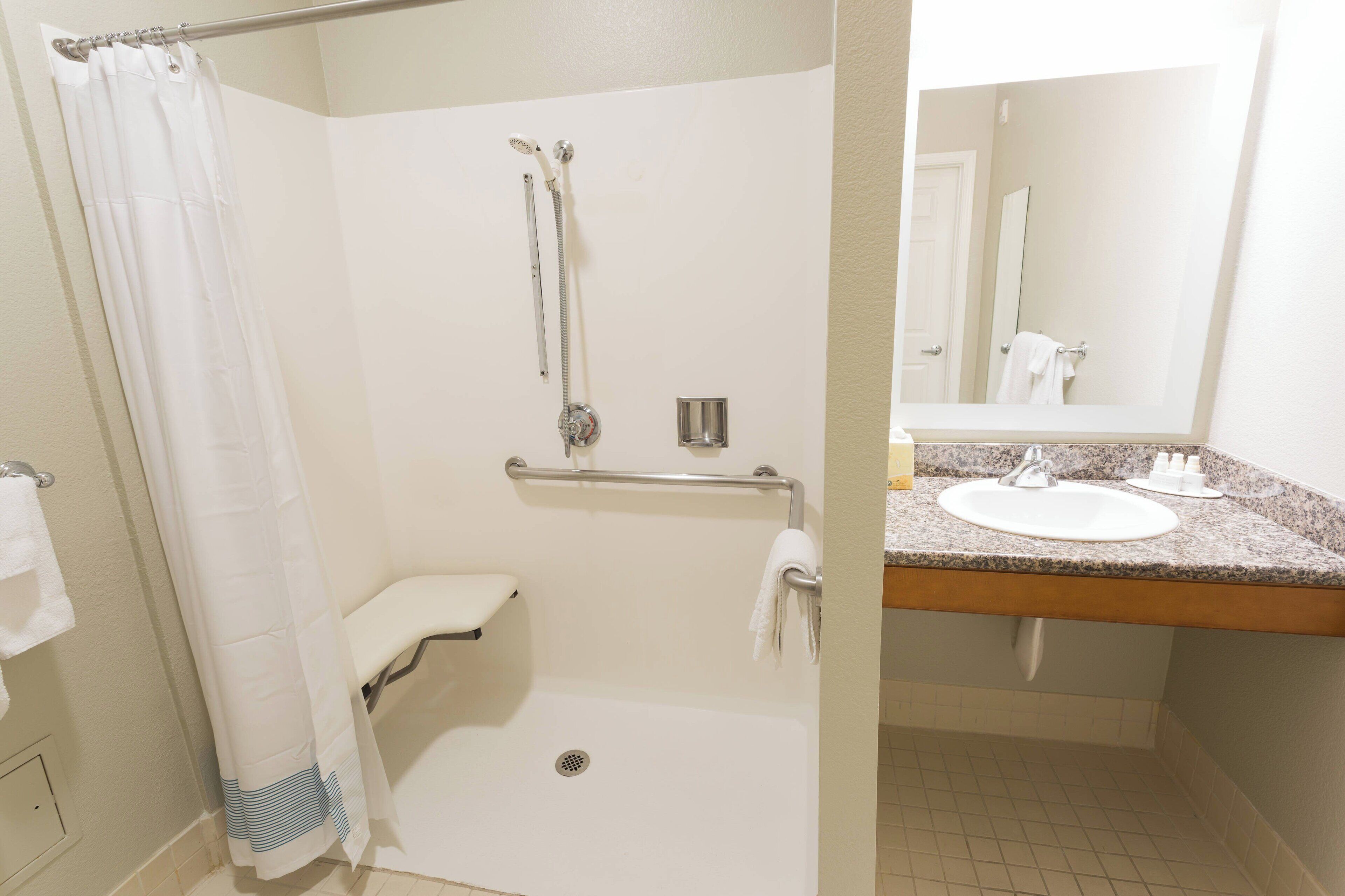 combined shower/bathtub, free toiletries, hair dryer, towels