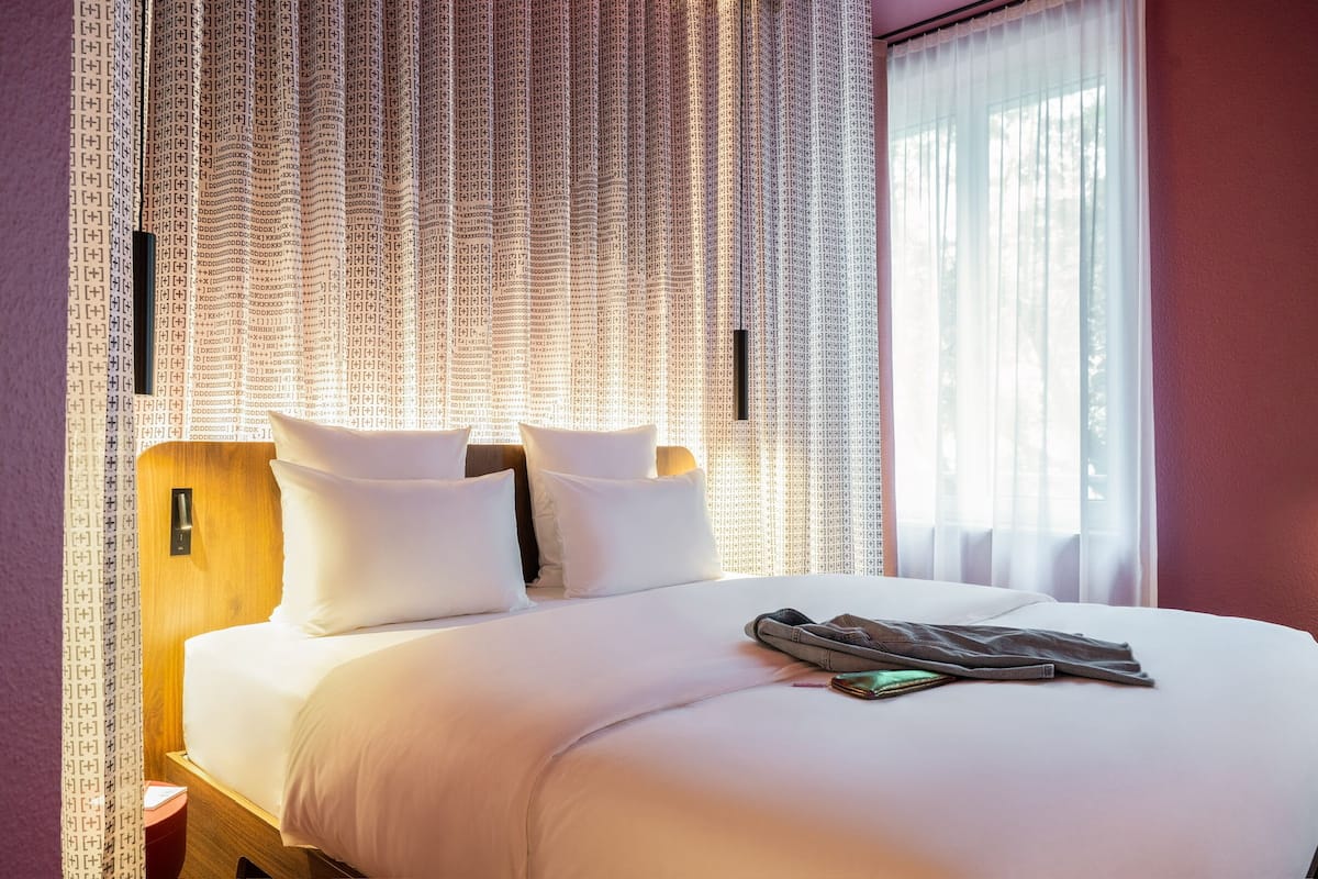 Room (Tribe Essential) | In-room safe, desk, laptop workspace, blackout drapes