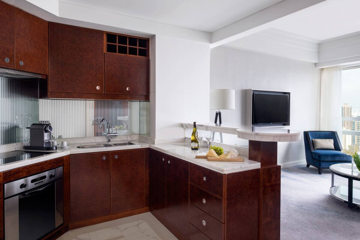 fridge, electric kettle, high chair