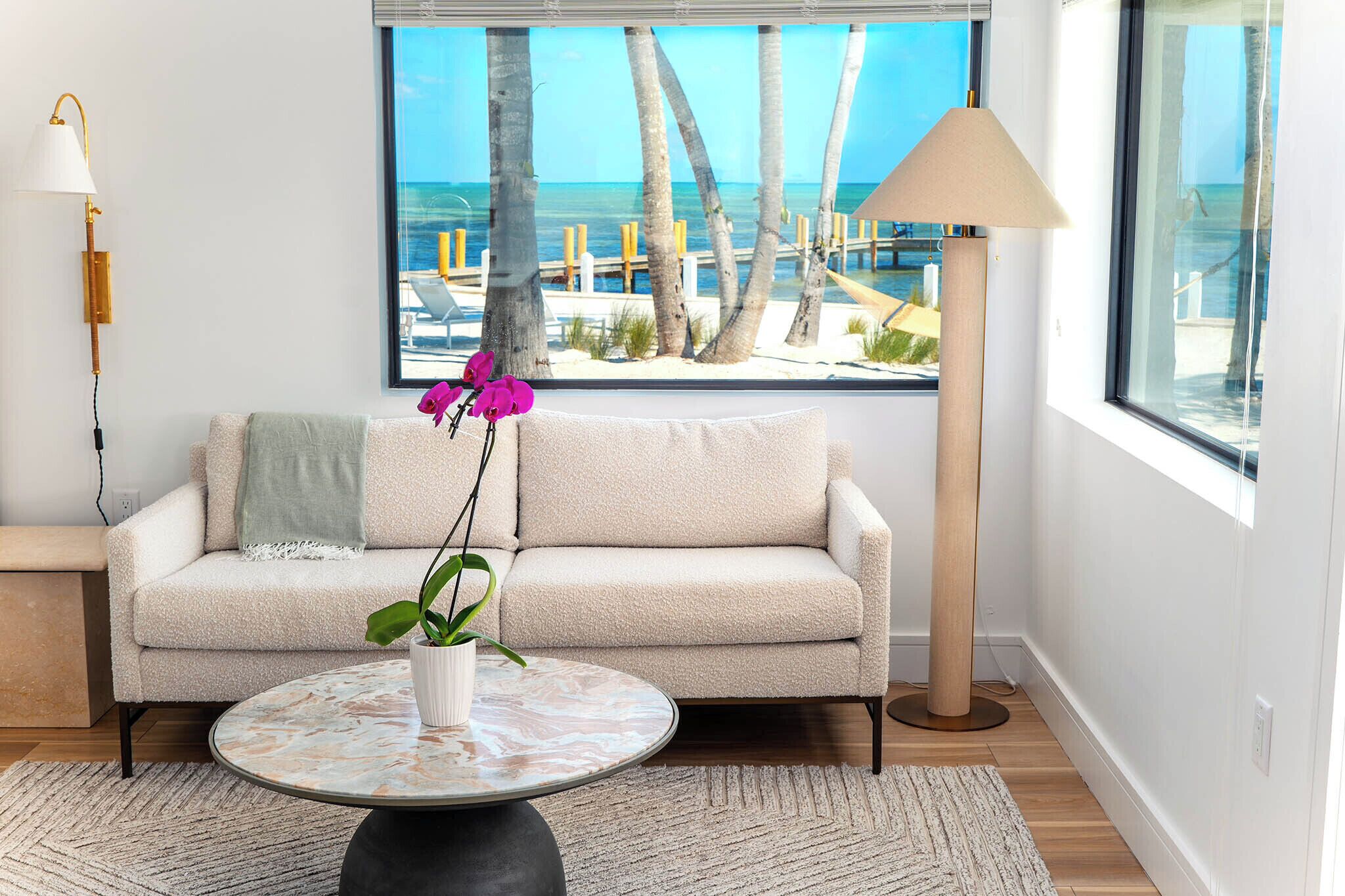 oceanfront pool view king room | living area | flat-screen tv