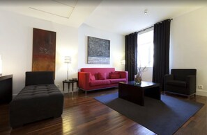 Junior Suite | Living room | Flat-screen TV