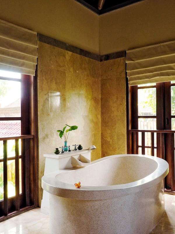 Separate tub and shower, deep soaking tub, eco-friendly toiletries