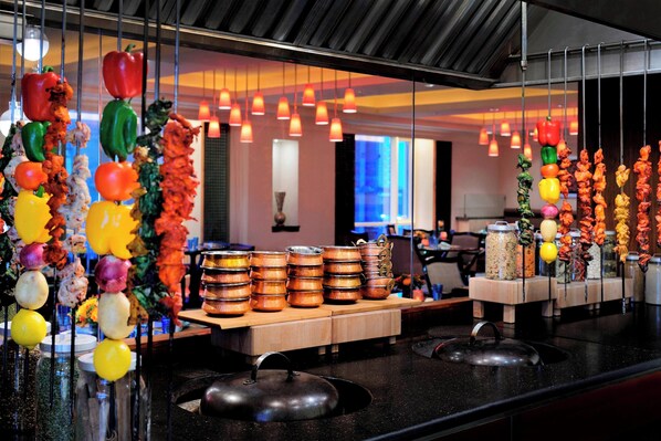 3 restaurants, breakfast, lunch, dinner served; Indian cuisine 
