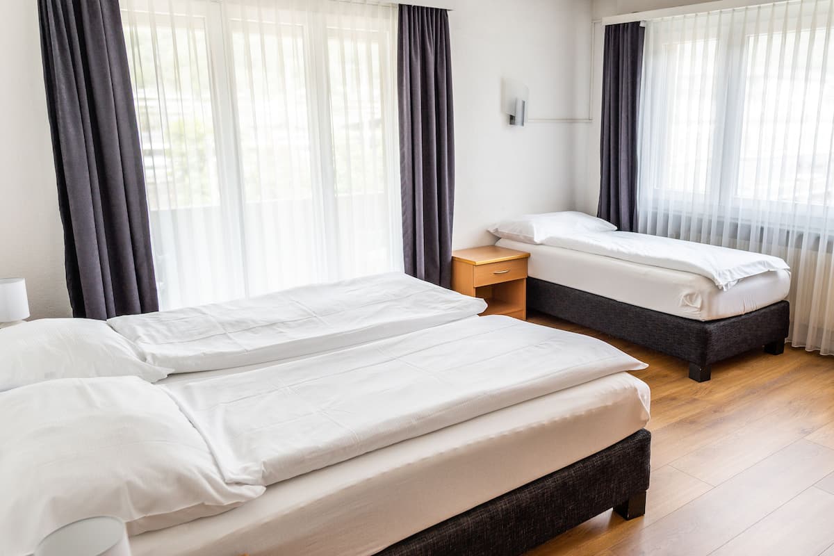 Triple Room | 2 bedrooms, desk, free WiFi, bed sheets