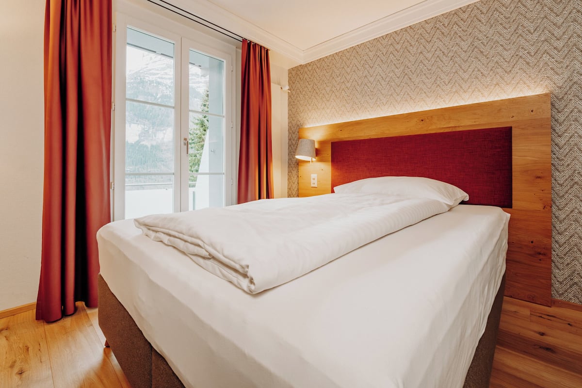Deluxe-Grandlit, Balkon, Bergblick | Literie hypoallergénique, coffres-forts dans les chambres, bureau