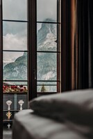 Chalet Twin Room, balcony, mountain view | Hypo-allergenic bedding, in-room safe, desk, iron/ironing board