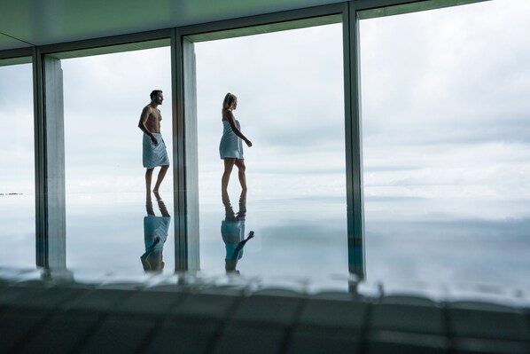 Indoor pool, open 7:00 AM to 9:00 PM, pool umbrellas, sun loungers