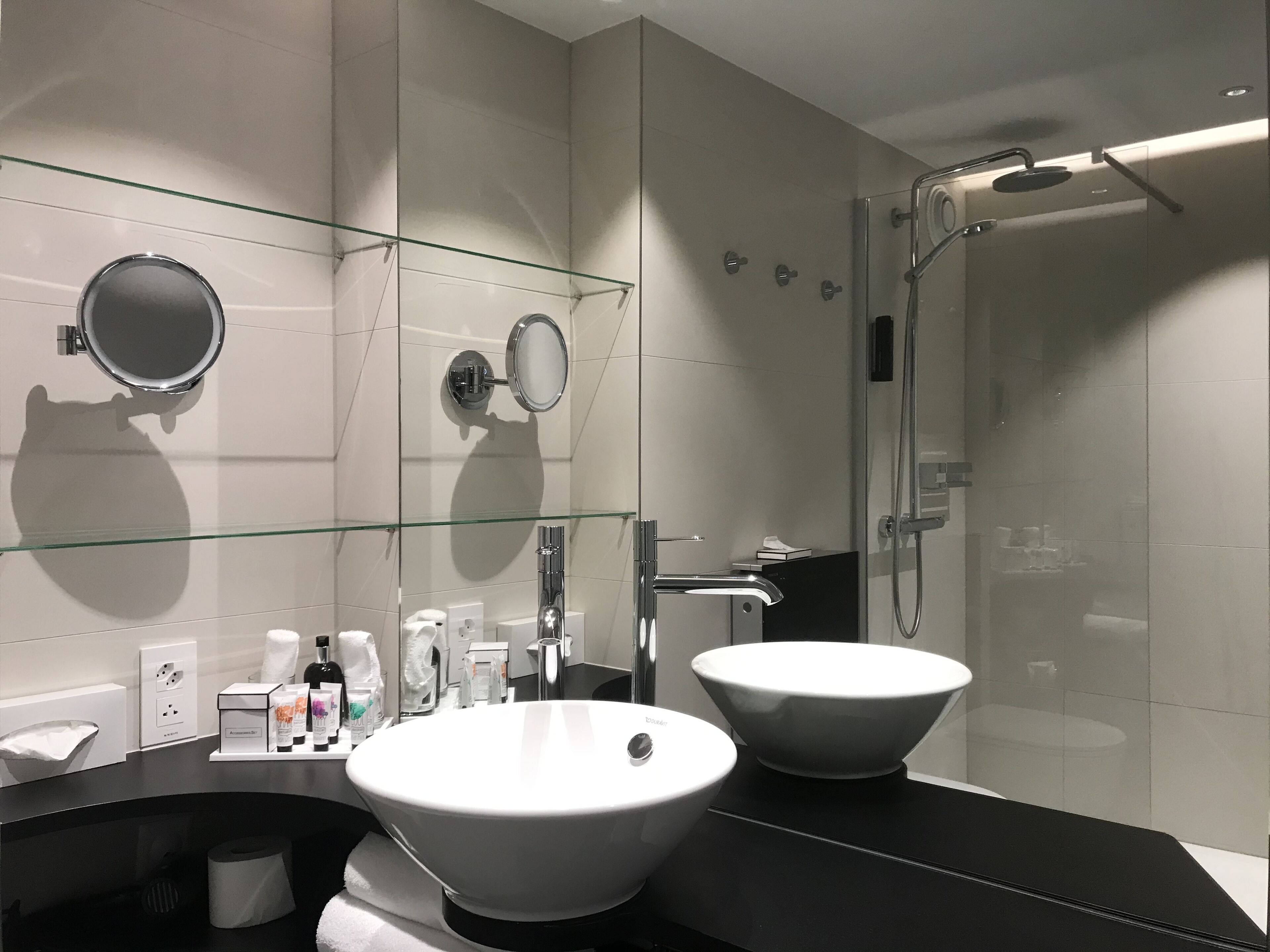 junior suite, lakeside | bathroom | shower, hair dryer, bathrobes, slippers