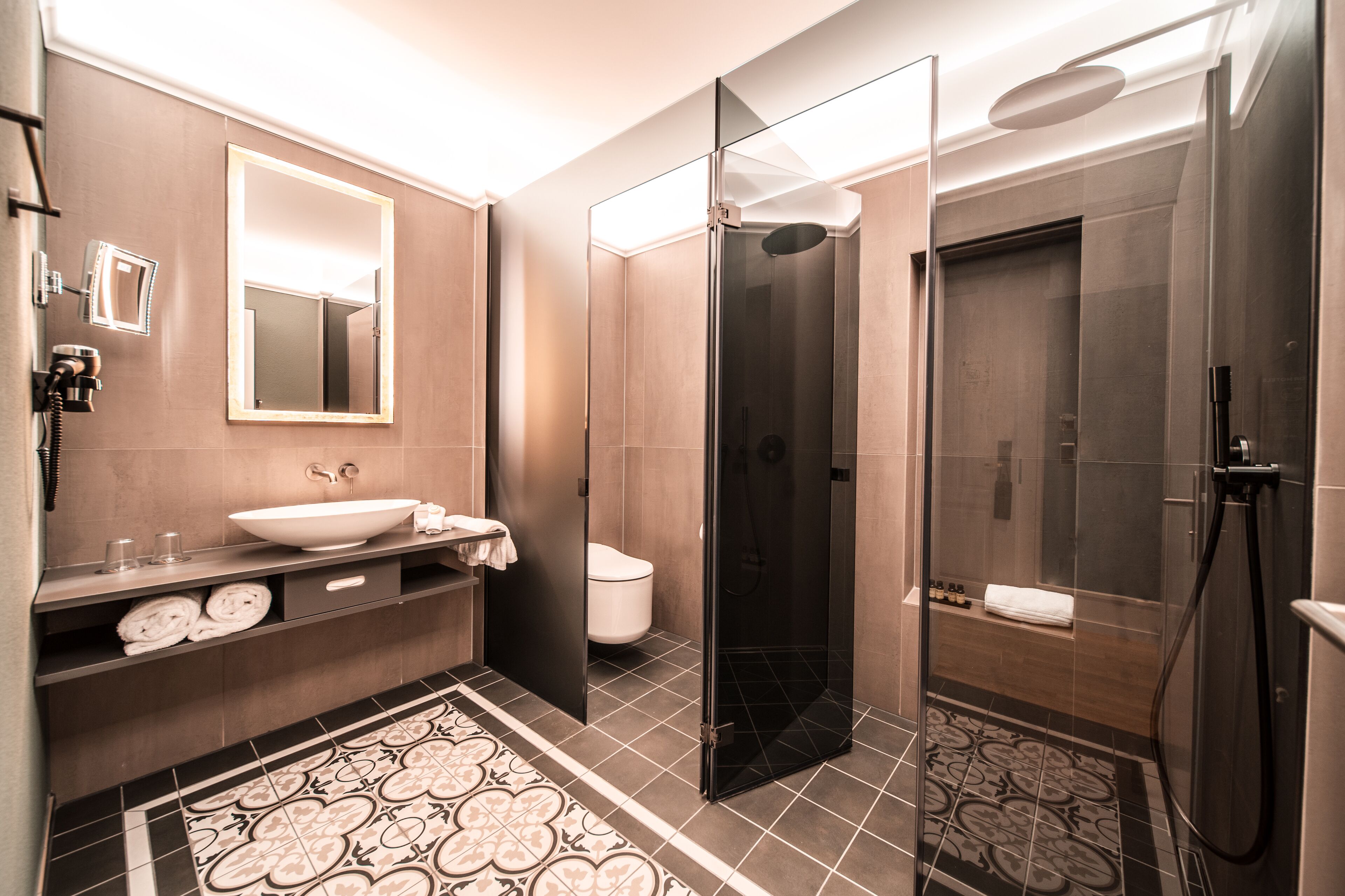 eco-friendly toiletries, hair dryer, bathrobes, slippers