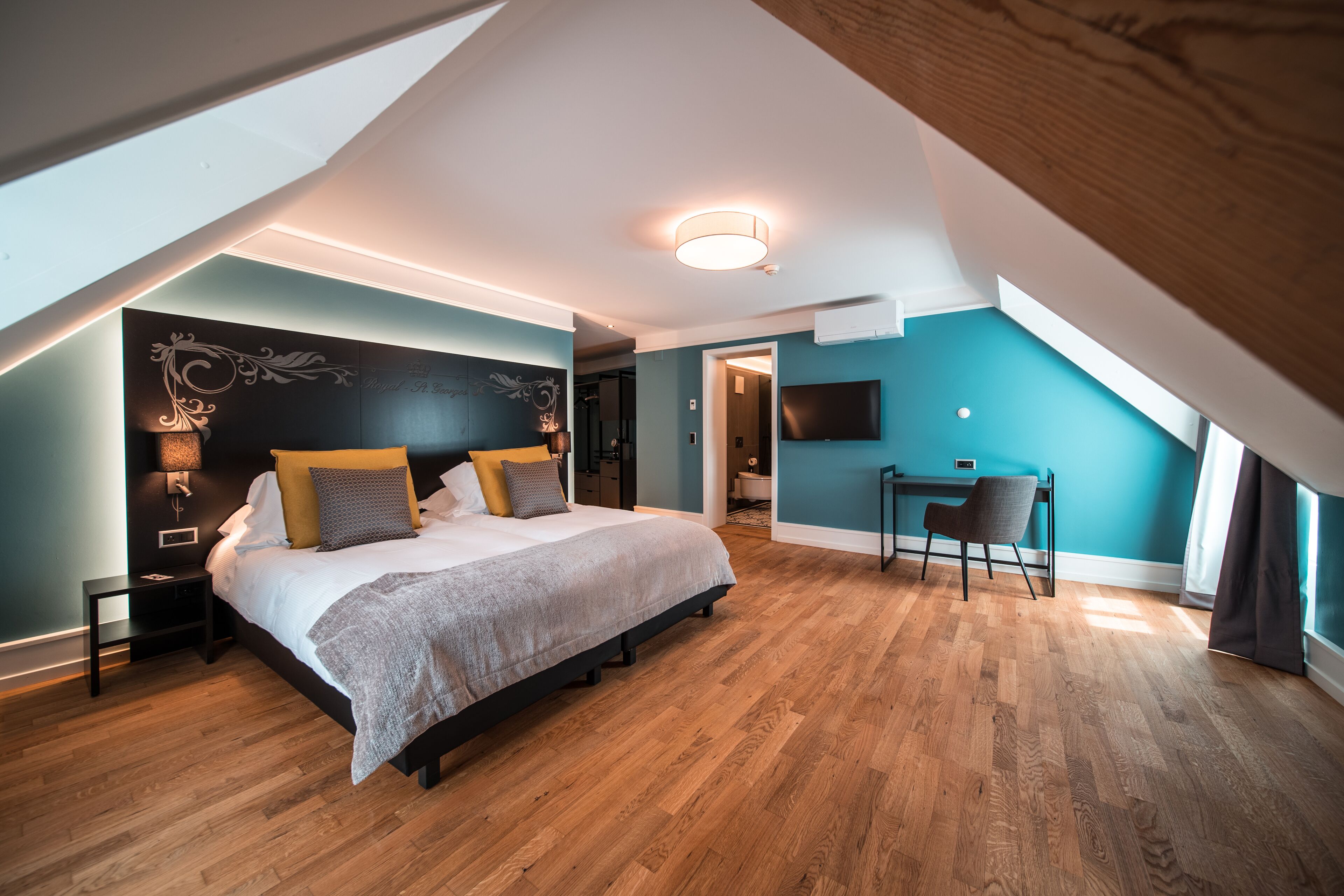 hypo-allergenic bedding, down duvets, in-room safe, desk