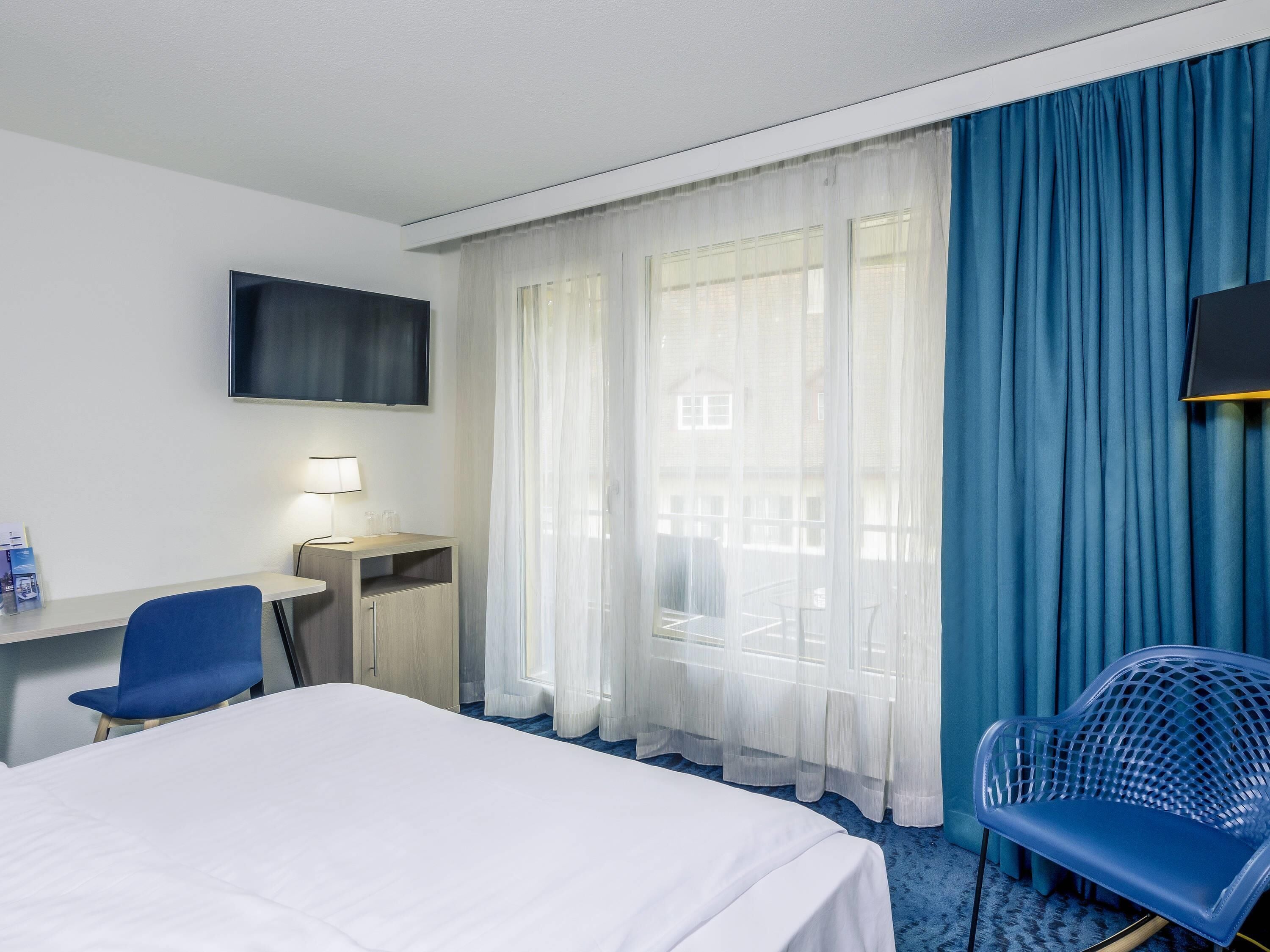 Free minibar, in-room safe, desk, blackout curtains