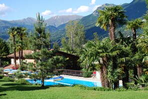 Seasonal outdoor pool, pool umbrellas, sun loungers