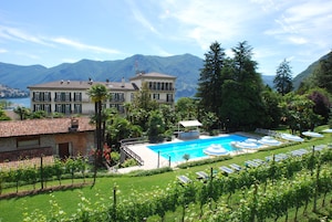 Seasonal outdoor pool, pool umbrellas, sun loungers