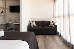 Minibar, bureau, système d’insonorisation, lit de bébé (supplément)