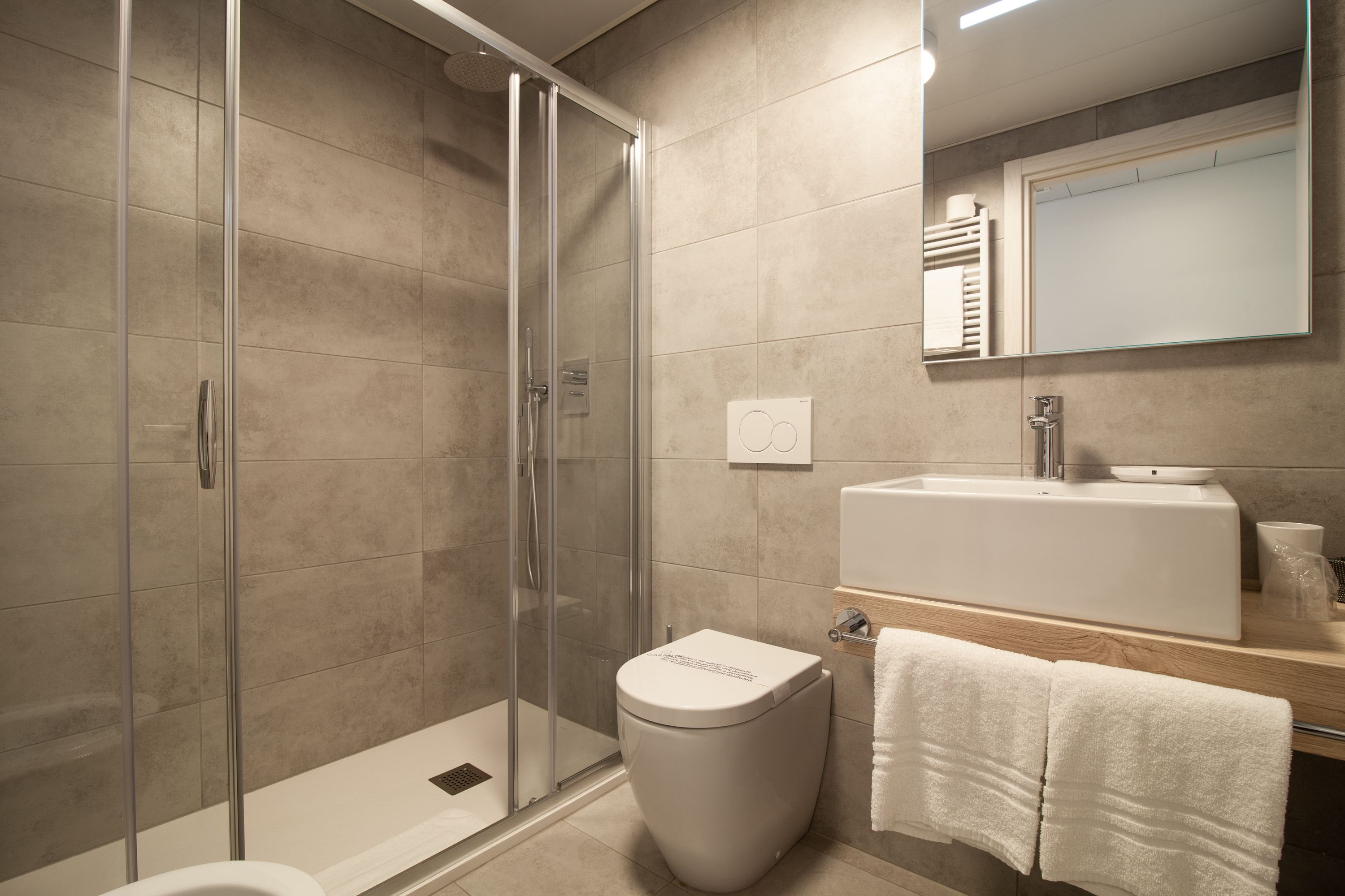 superior room | bathroom | hair dryer, bidet, towels