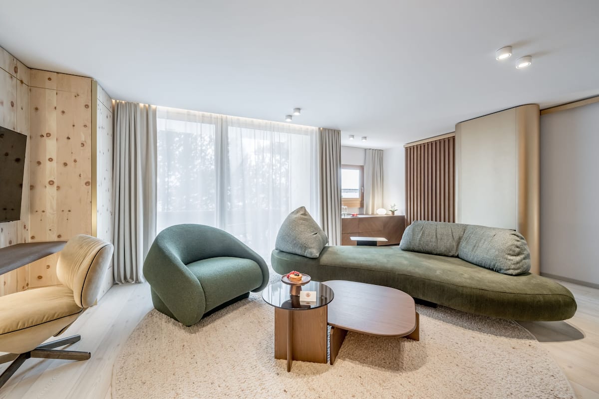 premium suite | living area | smart tv, heated floors, streaming services