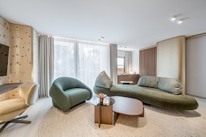 Premium Suite | Living area | Smart TV, heated floors, streaming services