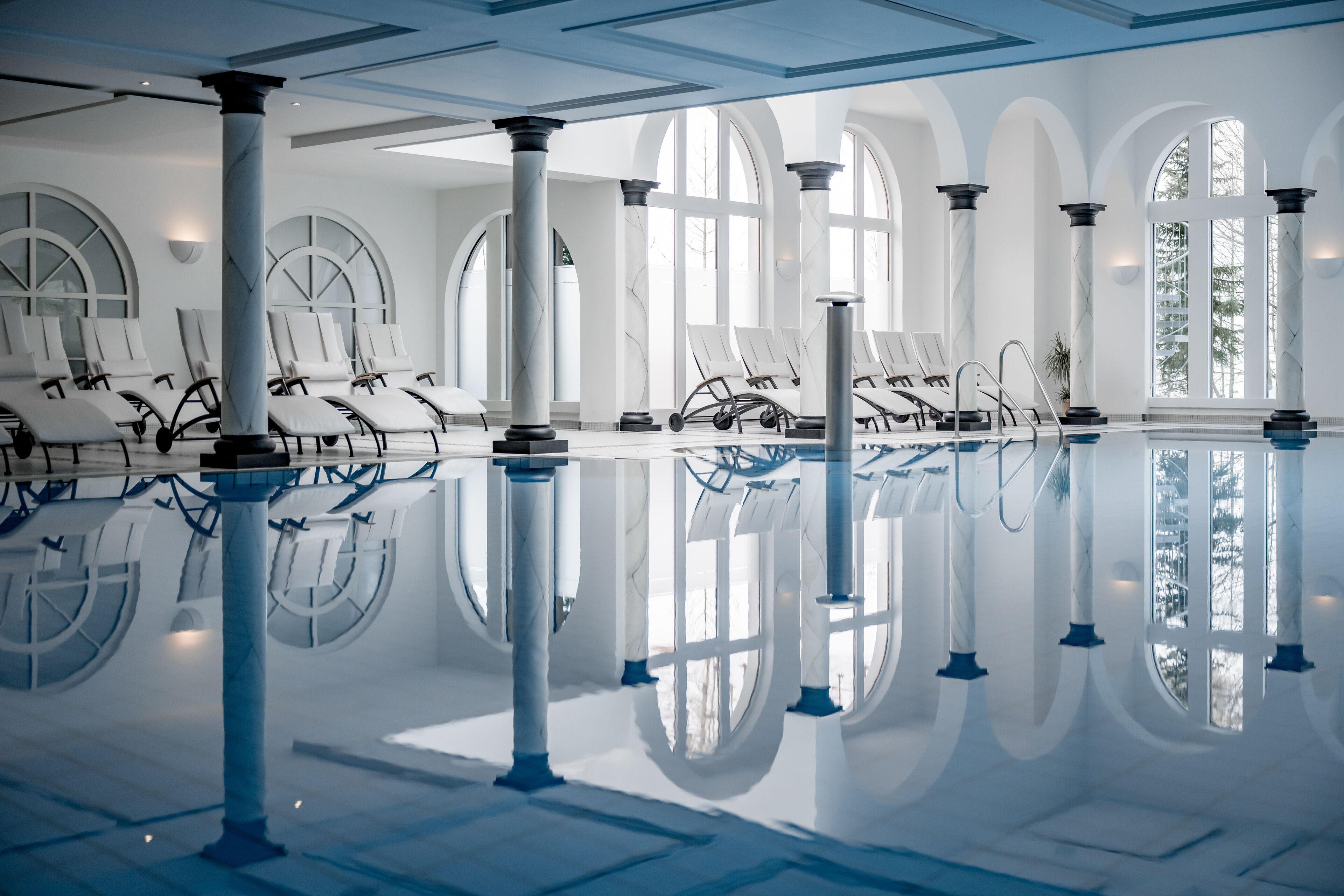 indoor pool, outdoor pool, pool loungers