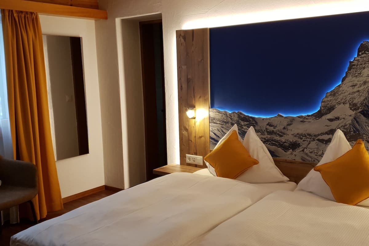 classic twin room | hypo-allergenic bedding, down duvets, in-room safe, desk