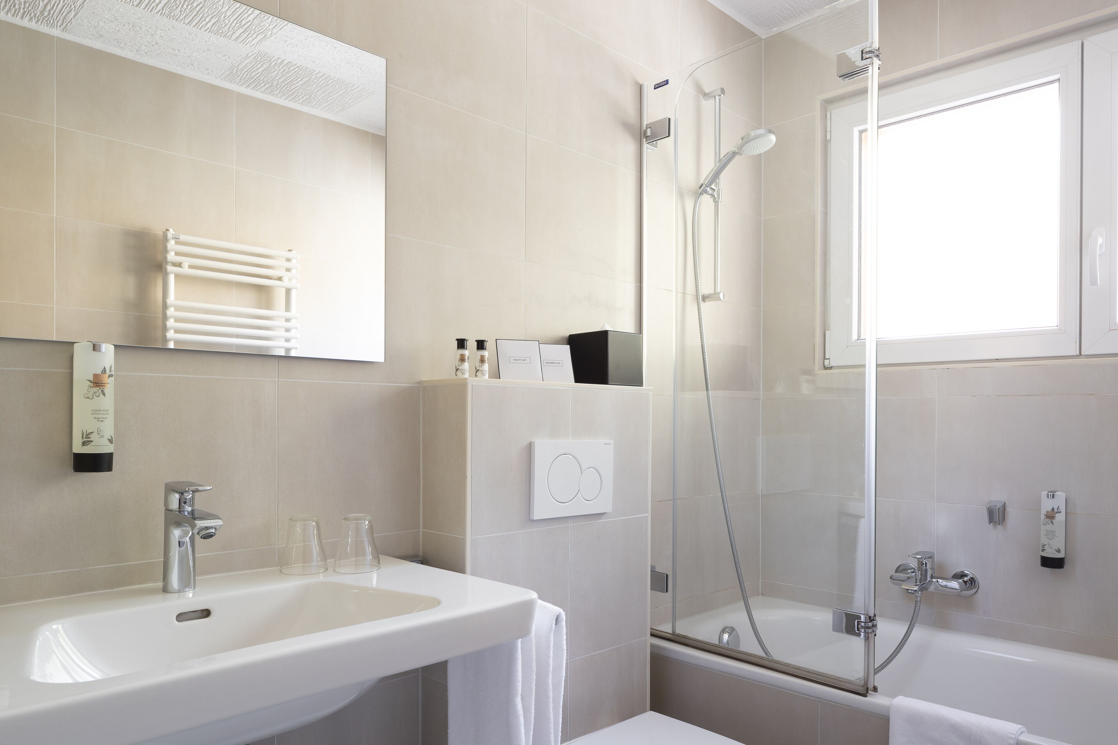 deluxe double room | bathroom | free toiletries, hair dryer, towels