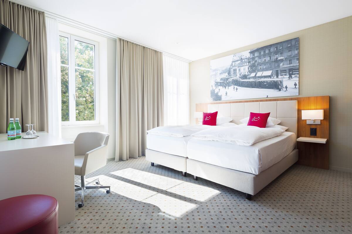 Luxe beddengoed, donsdekens, pillowtop-bedden, een kluis op de kamer