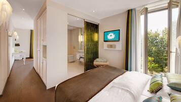 Suite | Una cassaforte in camera, tende oscuranti, Wi-Fi gratuito, lenzuola