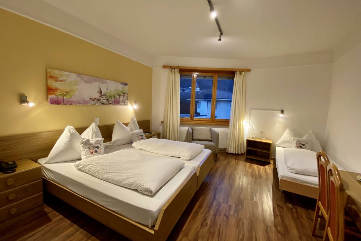 Basic Quadruple Room | 1 bedroom, in-room safe, desk, laptop workspace
