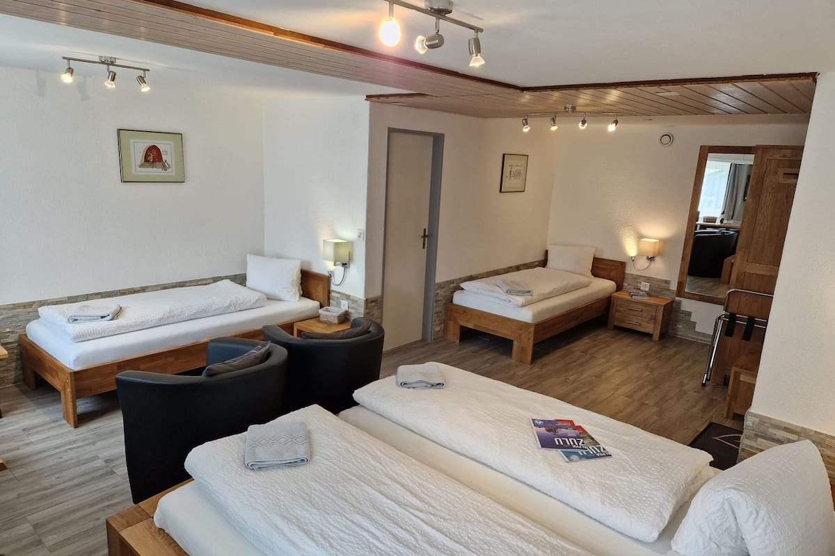 family quadruple room, 1 bedroom, non smoking, mountainside | 1 bedroom, in-room safe, desk, blackout curtains