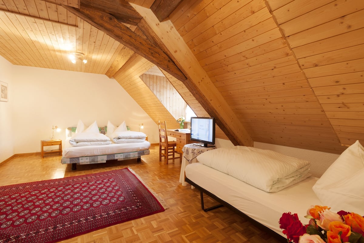 Quadruple Room (Attic) | Down comforters, in-room safe, individually decorated