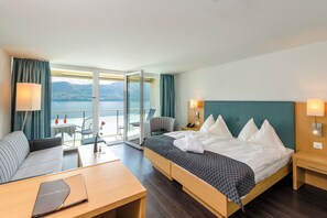 Habitación doble superior, balcón, vista al lago | Minibar, caja de seguridad en la habitación, escritorio y wifi gratis 