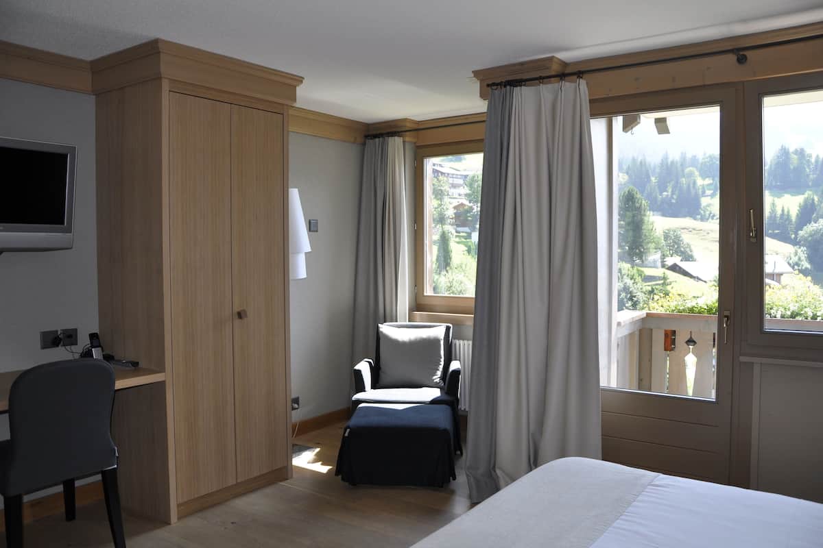Panoramic Suite, 2 Bedrooms, Balcony, Mountainside | Minibar, in-room safe, desk, blackout curtains