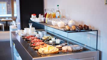 Daily buffet breakfast (CHF 20 per person)