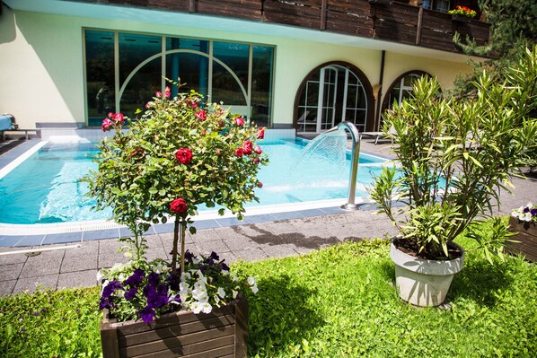 Indoor pool, outdoor pool, pool umbrellas, sun loungers