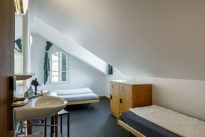 Twin Room, Shared Bathroom | 1 bedroom, in-room safe, blackout drapes, iron/ironing board