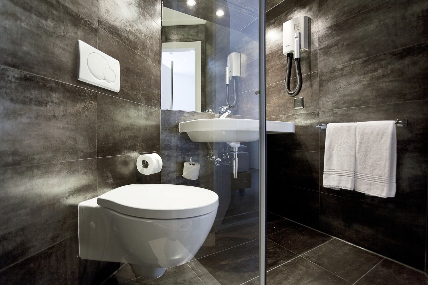 shower, eco-friendly toiletries, hair dryer, towels