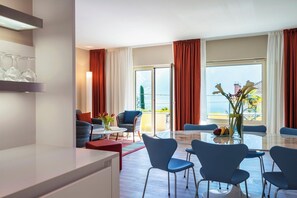 Three-Bedroom Family Suite with Garden and Partial Lake View | Living area | 36-inch flat-screen TV with satellite channels, TV