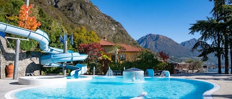 Indoor pool, pool umbrellas, pool loungers