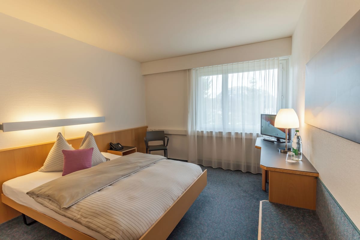 Chambre Simple | Bureau, Wi-Fi gratuit, draps fournis