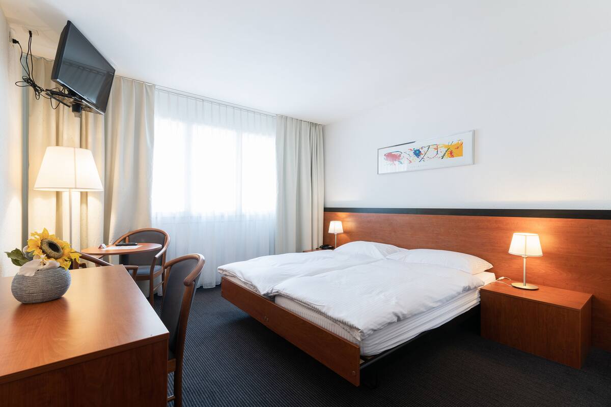 premium bedding, desk, blackout curtains, soundproofing