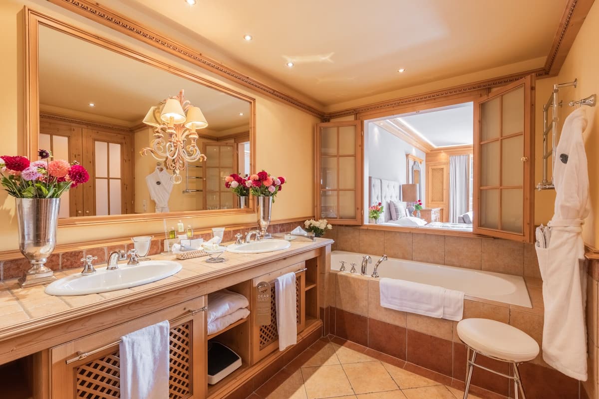 separate bathtub and shower, free toiletries, hair dryer, bathrobes